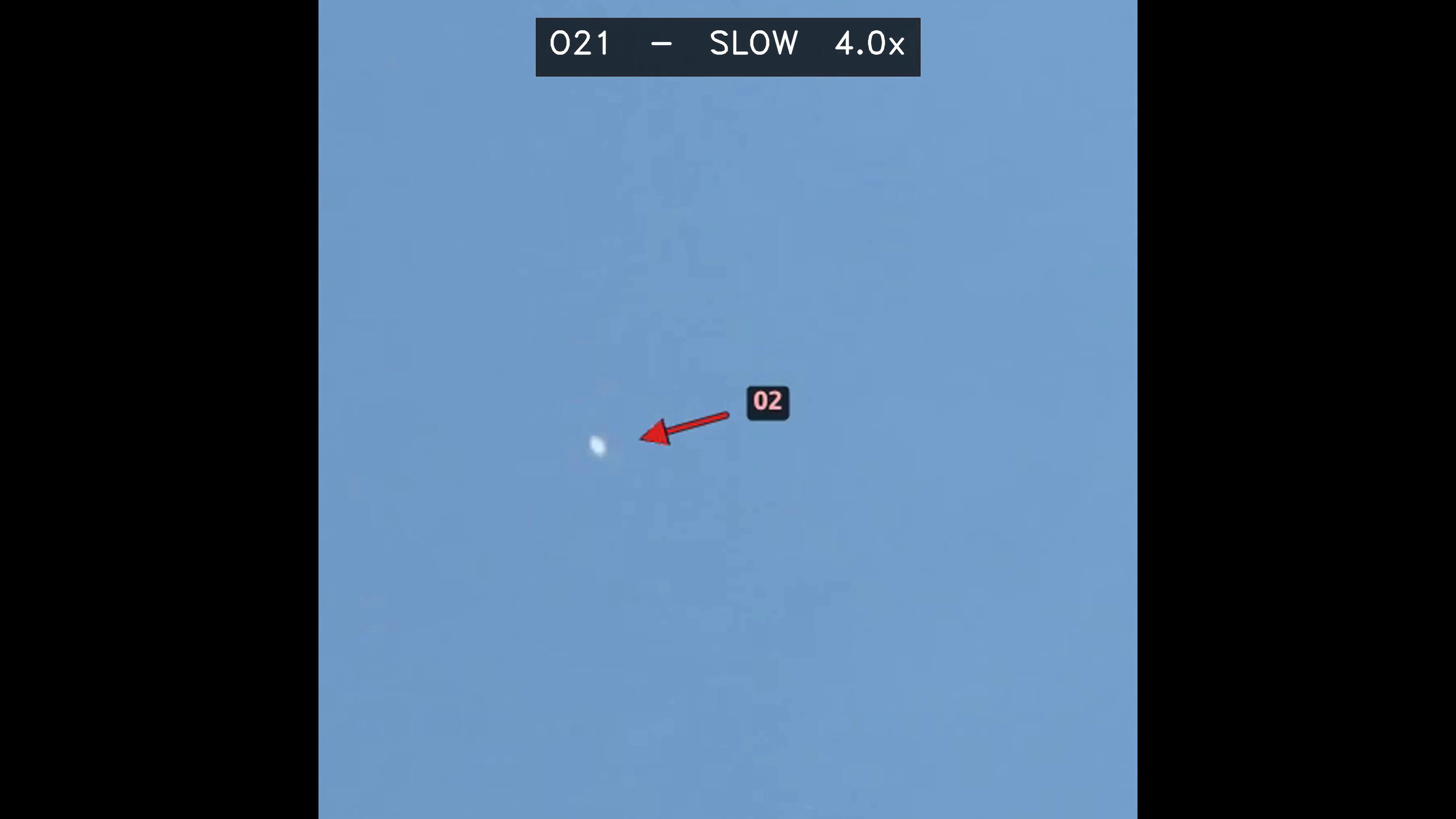 Zoomed-in view of single object with red arrow pointing at it